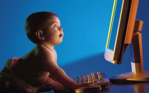 Funny baby with Computer